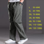 spring summer casual pants male big size 6XL Multi Pocket Jeans oversize Pants overalls elastic waist pants plus size men